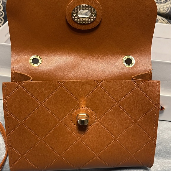 NWOT    5 inches x 7 inches petite bag.      brownish/Tannish - Picture 2 of 4